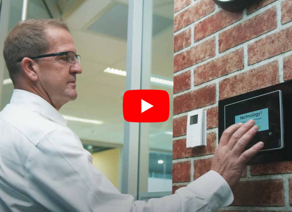 Gentleman controls a wall-mounted touch panel.